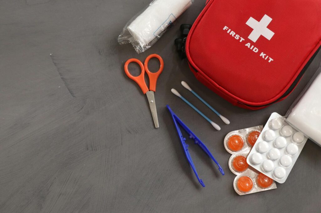 A close-up image of a first-aid kit with supplies for dog bite first aid — what to do after a dog bite