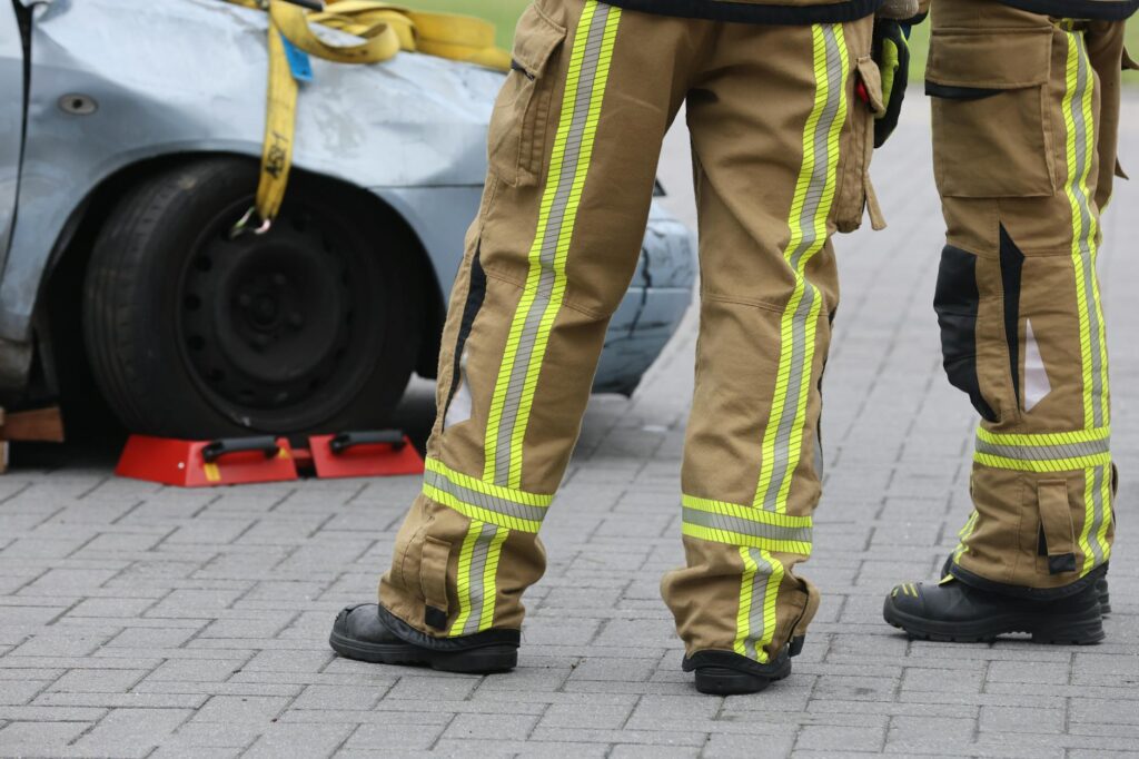 Image of a car accident scene with emergency services present. — after car accident steps