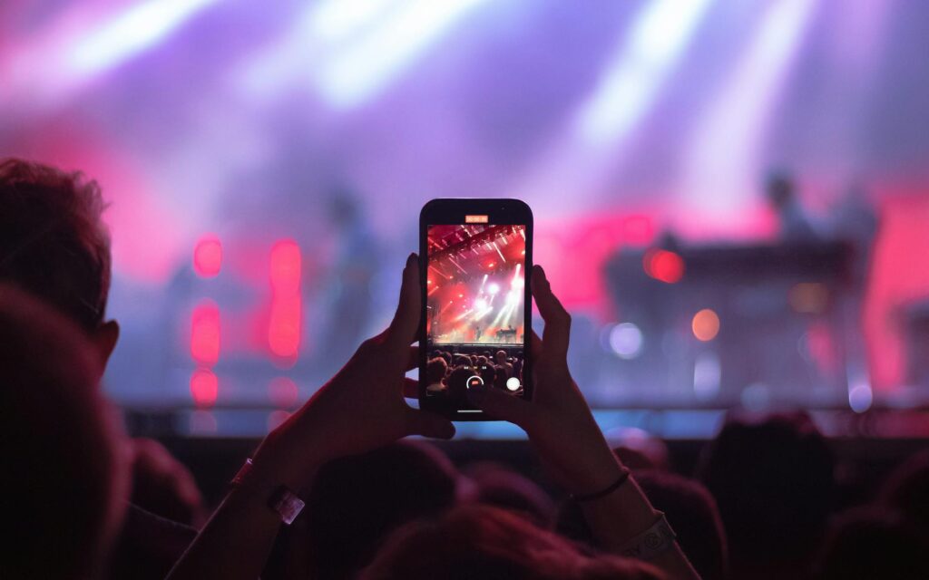 Image showing a person documenting the accident with a smartphone. — after car accident steps