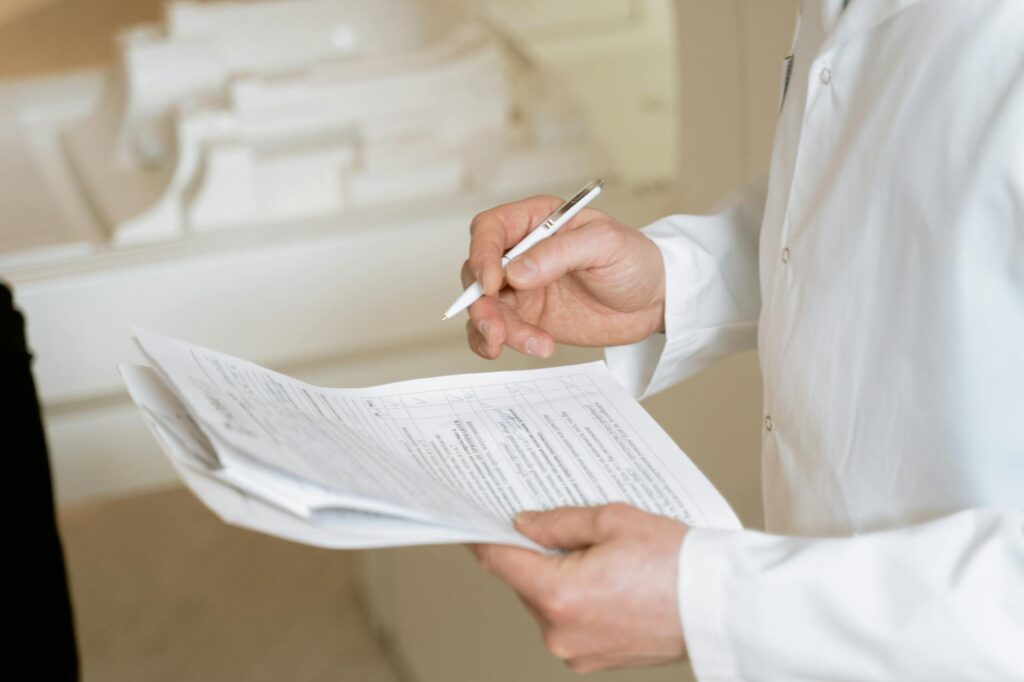 Image showing a person reviewing medical documentation related to their injury claim. — factors affecting injury claim s…