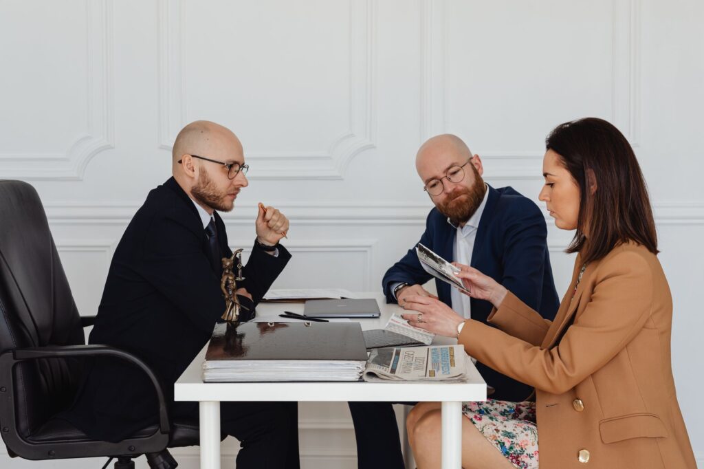 A photo of a person meeting with a legal professional about their injury claim. — insurance company injury claim evaluation