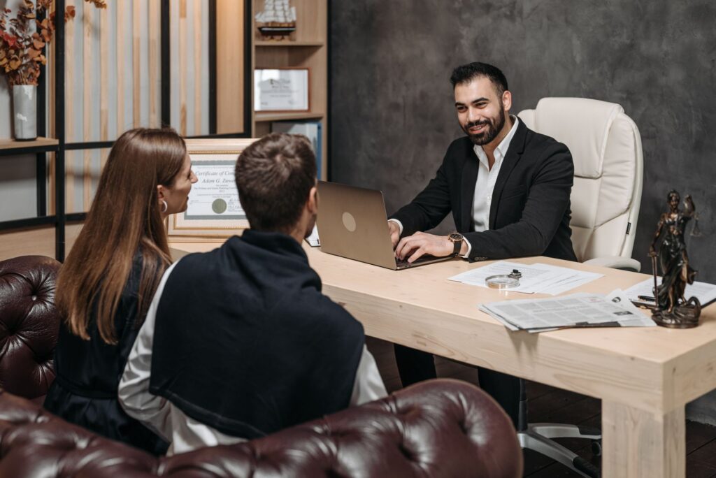 An image showing a laptop screen with positive client reviews of a personal injury attorney. — choosing an injury lawyer