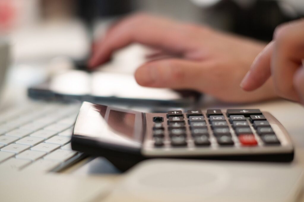 Image of a satisfied user inputting data into an injury claim calculator. — best online injury claim calculator