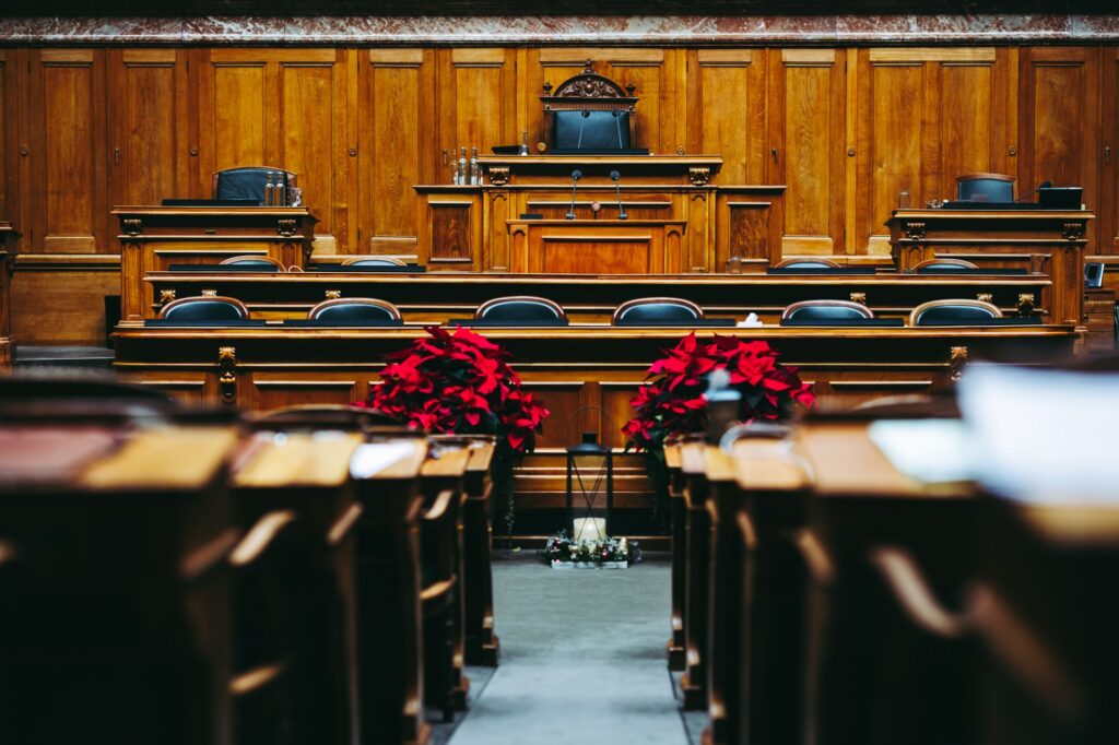 Photo of a courtroom to represent trials in injury claims — injury claim process