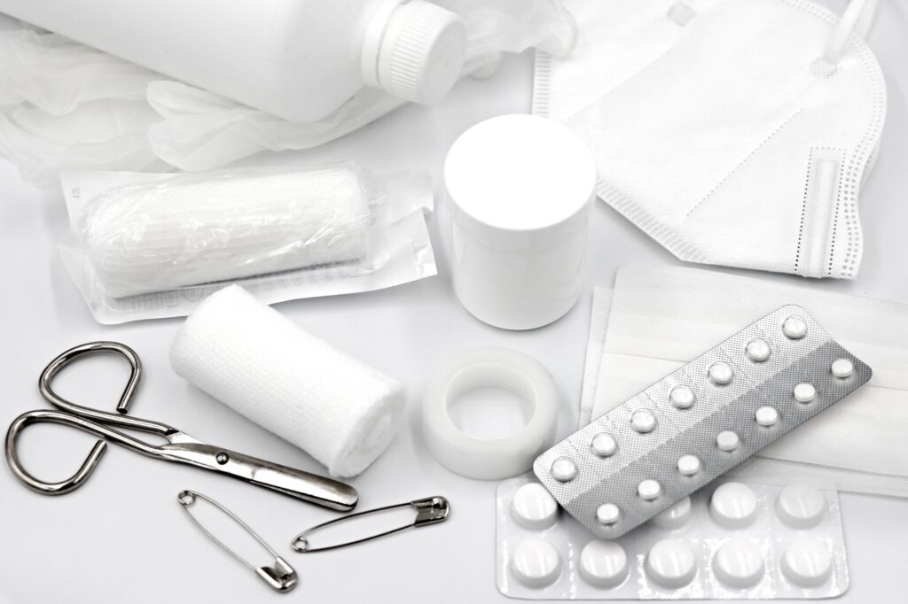 A photo of a first aid kit with essential supplies for treating injuries. — steps after an injury
