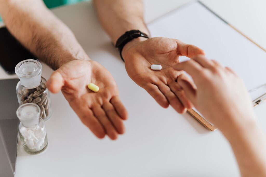 A photo of a medical professional consulting with a patient about future treatment options. — Estimate future medical ex…