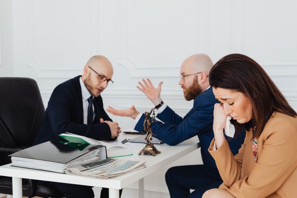A photograph of a legal consultation, emphasizing the importance of seeking help to calculate pain and suffering.