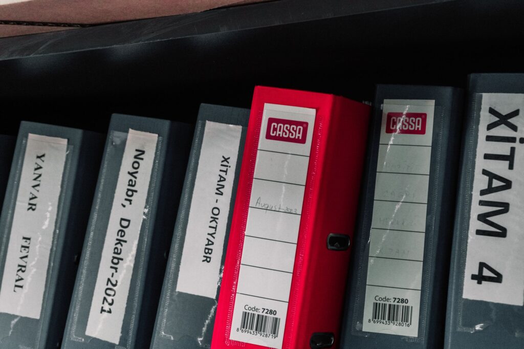 A well-organized binder containing medical records and receipts. — calculate medical expenses injury claim