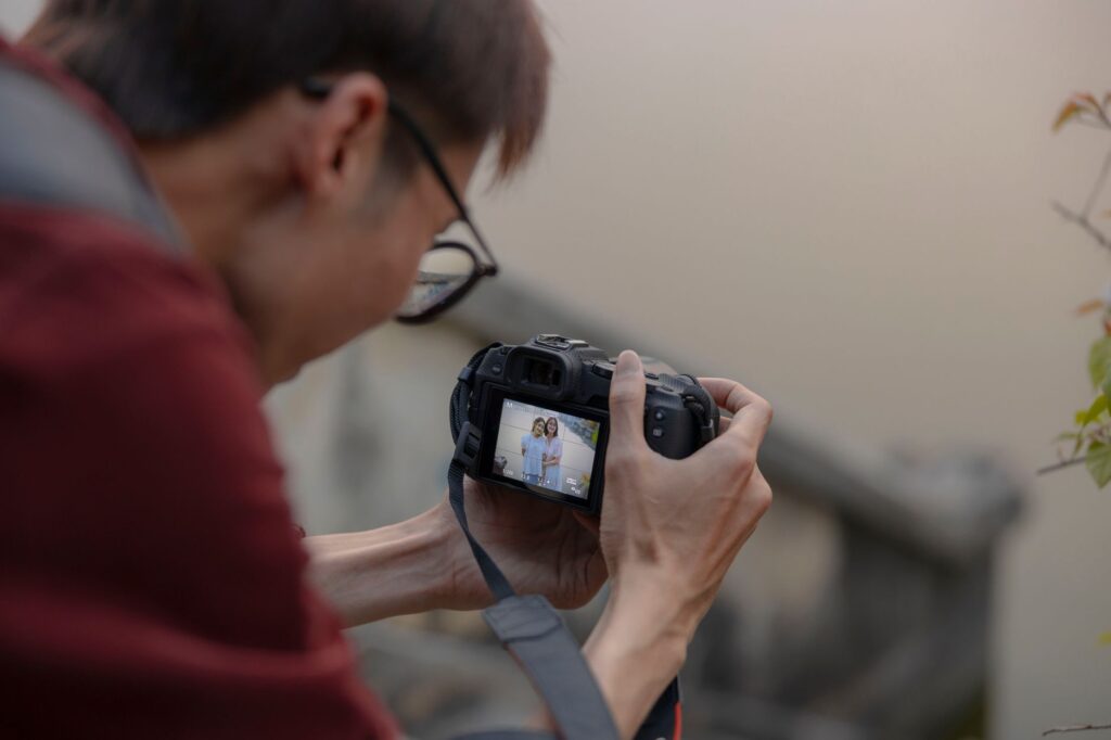 An image showing a person taking photos at an accident scene, capturing evidence for their injury claim. — gather eviden…