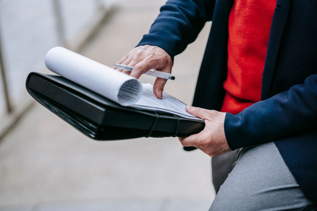 Illustration of a person organizing their documentation for an injury claim. — evidence for injury claim