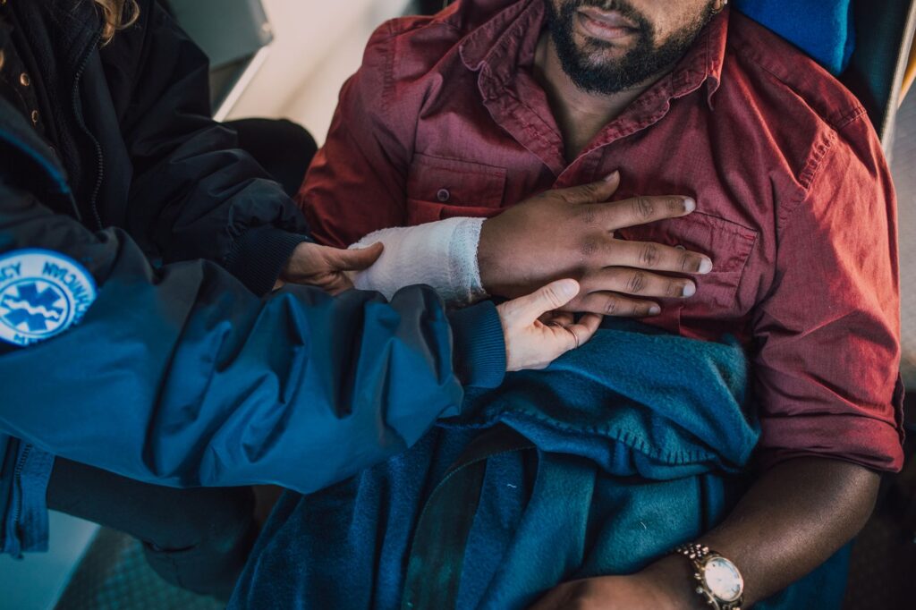 A photo of a person receiving medical attention after an injury, relevant to the injury claim checklist