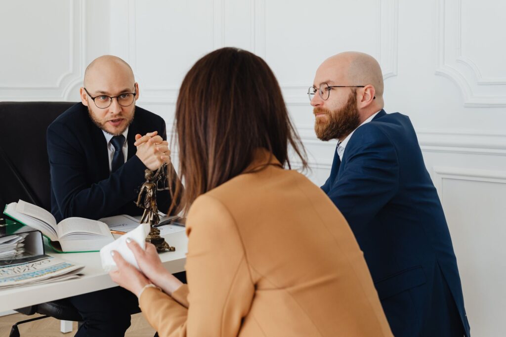 A picture of a lawyer discussing settlement strategies with a client, emphasizing the importance of legal advice. — fact…