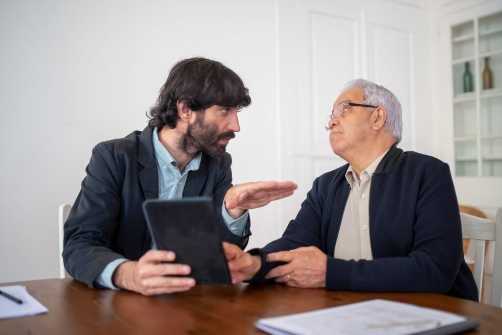 A professional discussing wage loss compensation with a client. — lost wages calculation injury claim