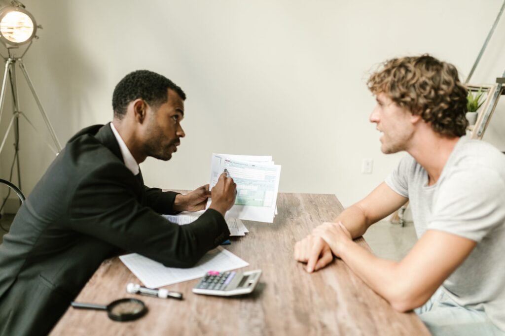 An expert consultant reviewing an injury claim case with a claimant. — lost wages calculation injury claim