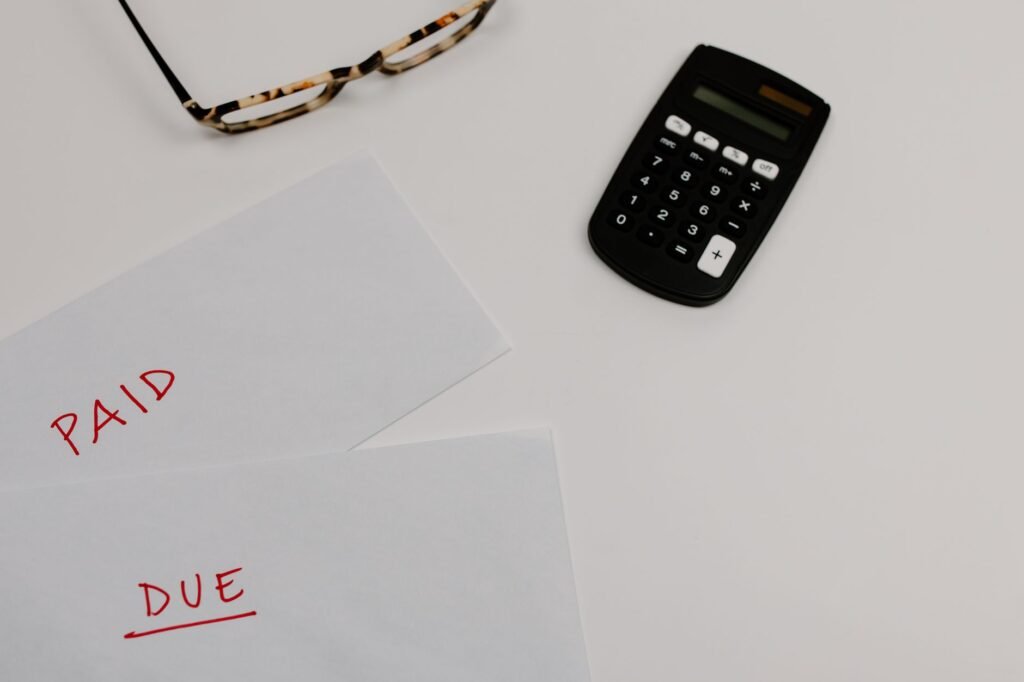 An image depicting a person calculating lost wages due to an injury. — factors influencing injury claim