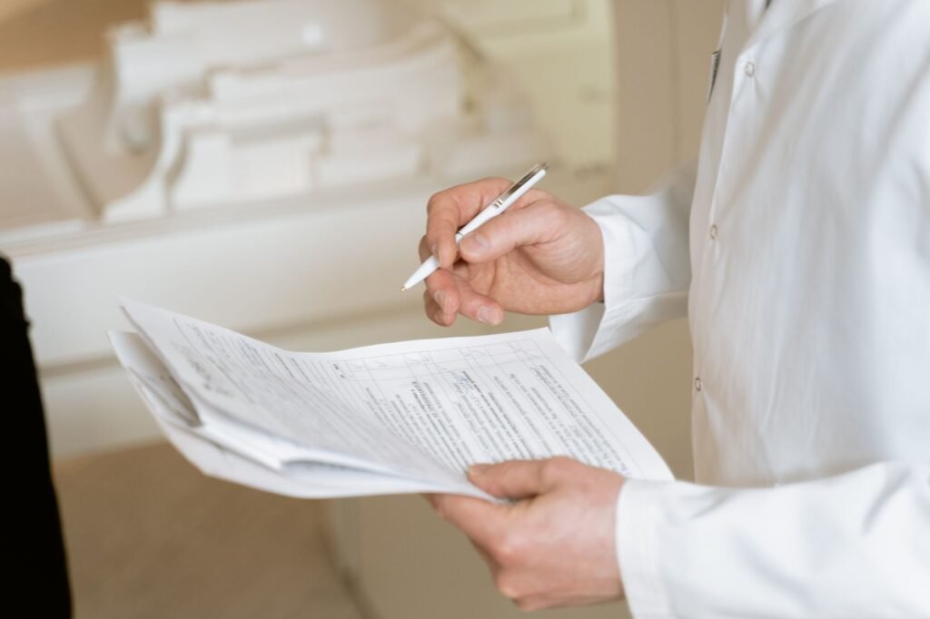 An image depicting a person reviewing medical records related to their injury. — documentation for injury claims