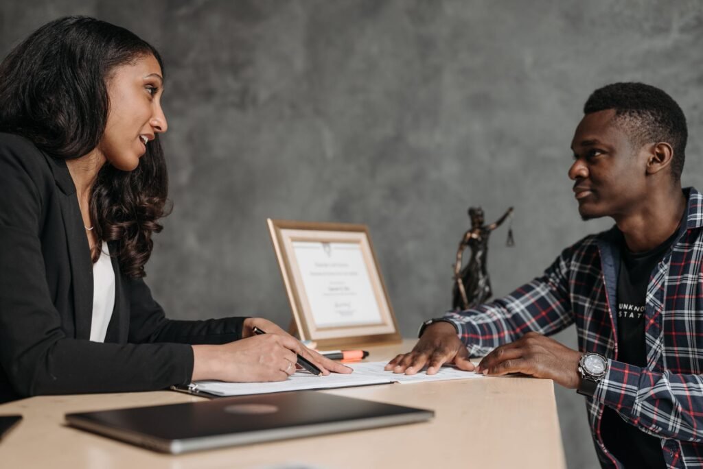 An image showing a person consulting with a legal expert about their injury compensation. — mistakes injury claim calcul…
