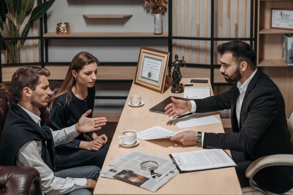A lawyer reviewing injury documentation with a client, highlighting teamwork. — documenting injury for claim