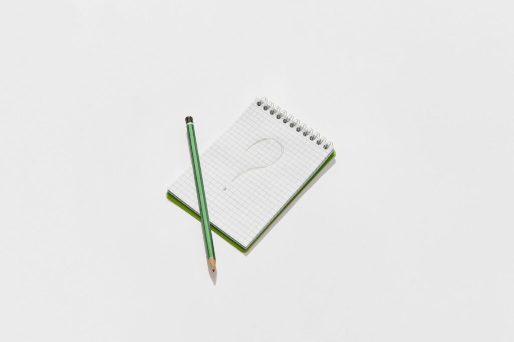 A notepad with questions written down for an injury claim consultation. — prepare for injury claim consultation