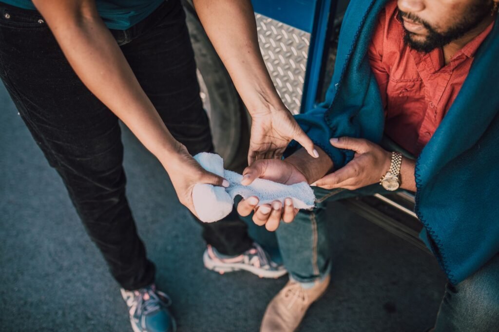A person receiving medical treatment after an injury, emphasizing the importance of seeking medical help. — mistakes in …