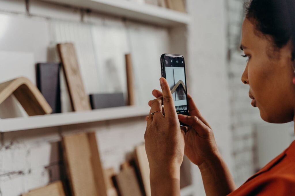 A person taking photos of their injury with a smartphone, focusing on the details. — documenting injury for claim