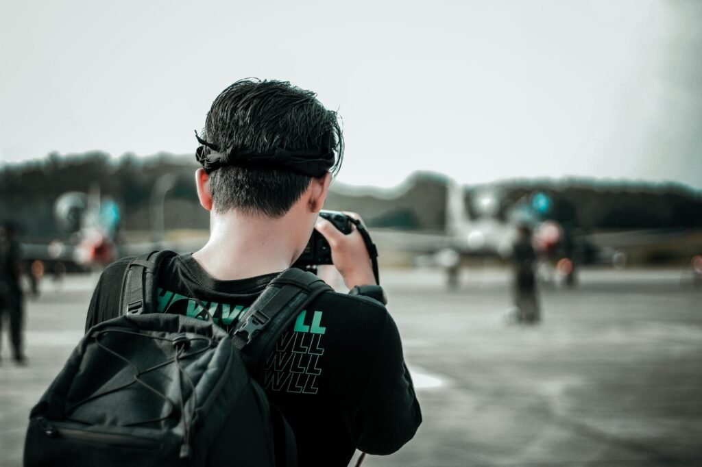 A photo of a person documenting an accident scene with a camera. — documentation for injury claims