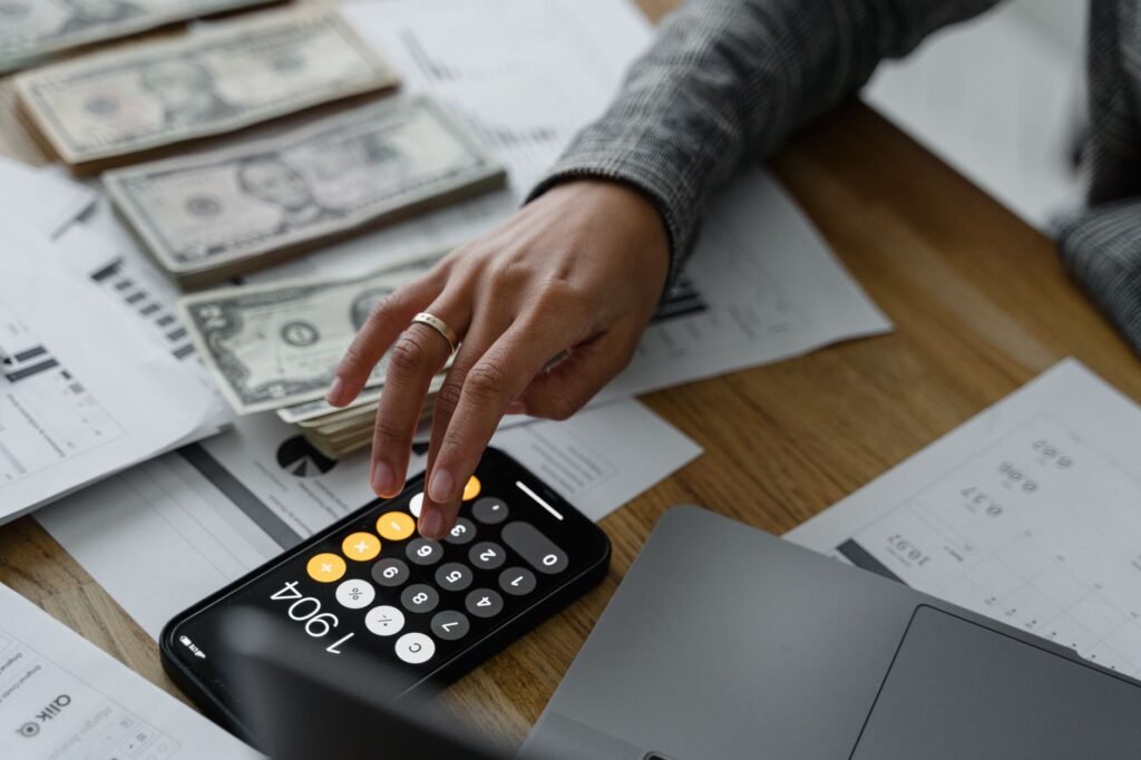 A photo of a person documenting their injury-related expenses using an injury claim calculator