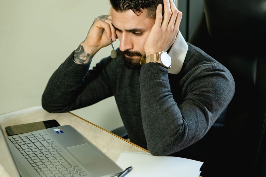 A professional consulting with a client about their injury claim, focusing on estimating injury claim online.