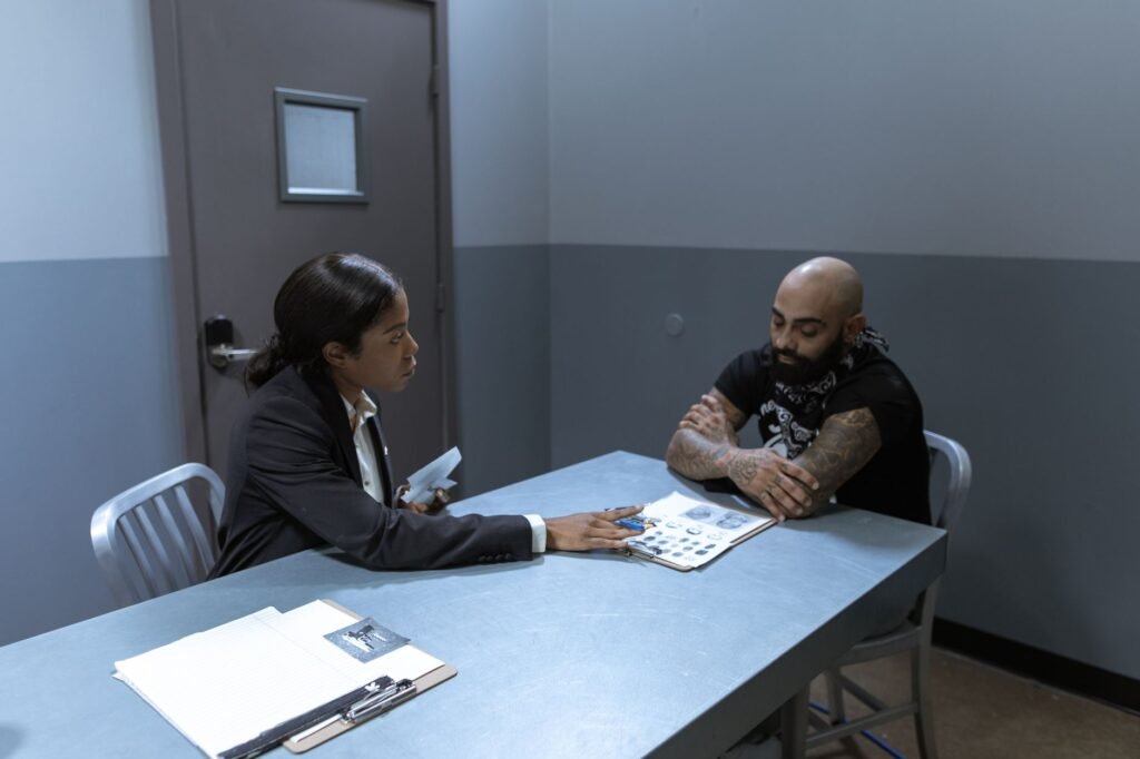 An image depicting a meeting between a claimant and their attorney discussing the injury claim investigation process.