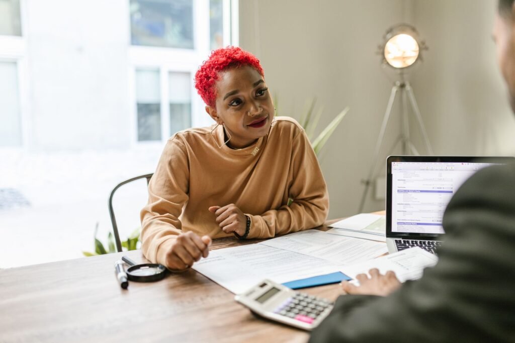 An image of a professional consulting with a client about injury claims, highlighting mistakes using injury claim calculator.