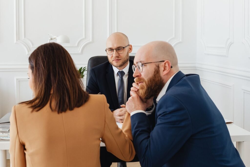 Image depicting a lawyer negotiating on behalf of a client, focusing on factors affecting injury claim values