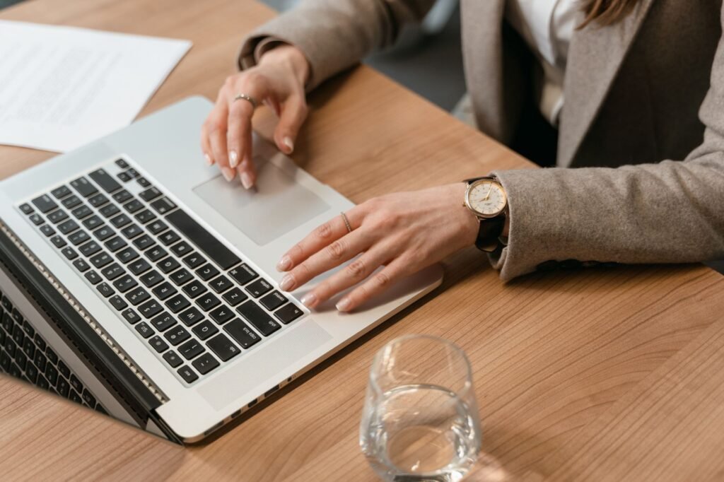 Image of a person using an online claim tool on a laptop. — best injury claim calculators