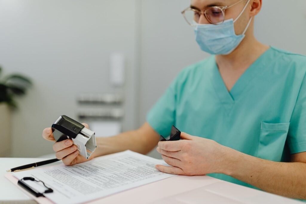 A photo of a person reviewing medical documents — mistakes when filing injury claim