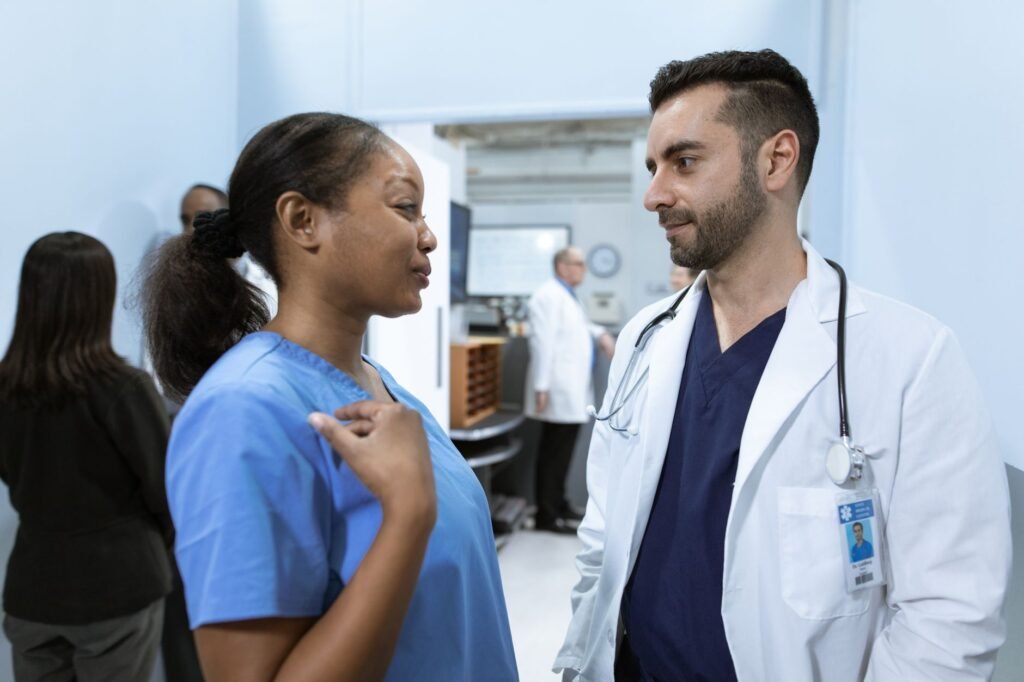 A photo of medical professionals discussing a patient's future care plan. — future medical expenses injury claims