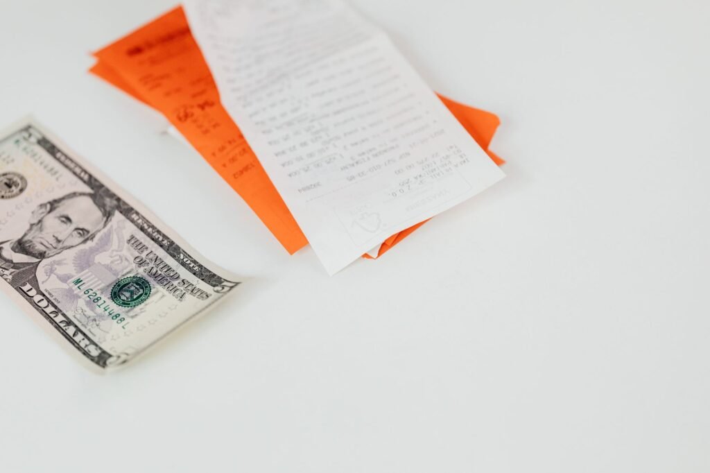A visual representation of various medical bills and receipts related to an injury. — estimate medical expenses injury c…