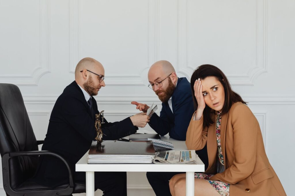 A worried individual contemplating hiring a lawyer. — do you need a lawyer for injury claim