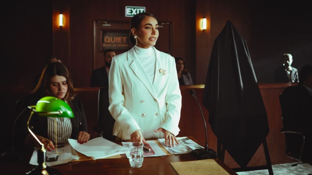 An image depicting a courtroom setting with an attorney presenting evidence for injury claim in front of a judge.