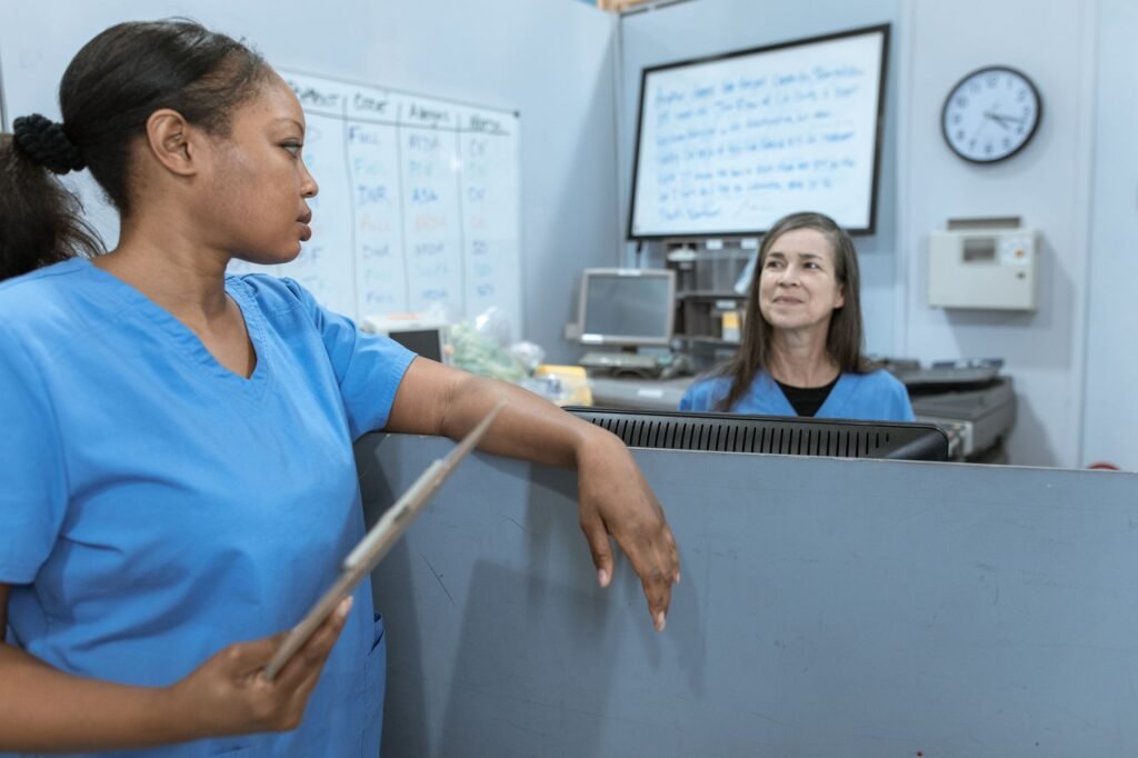 An image of a healthcare provider discussing medical records with a patient. — medical records injury claim