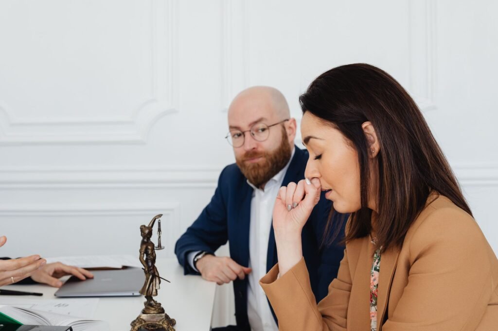 Image of a person consulting with an attorney about an injury claim, focusing on what to include in injury claim calculati…