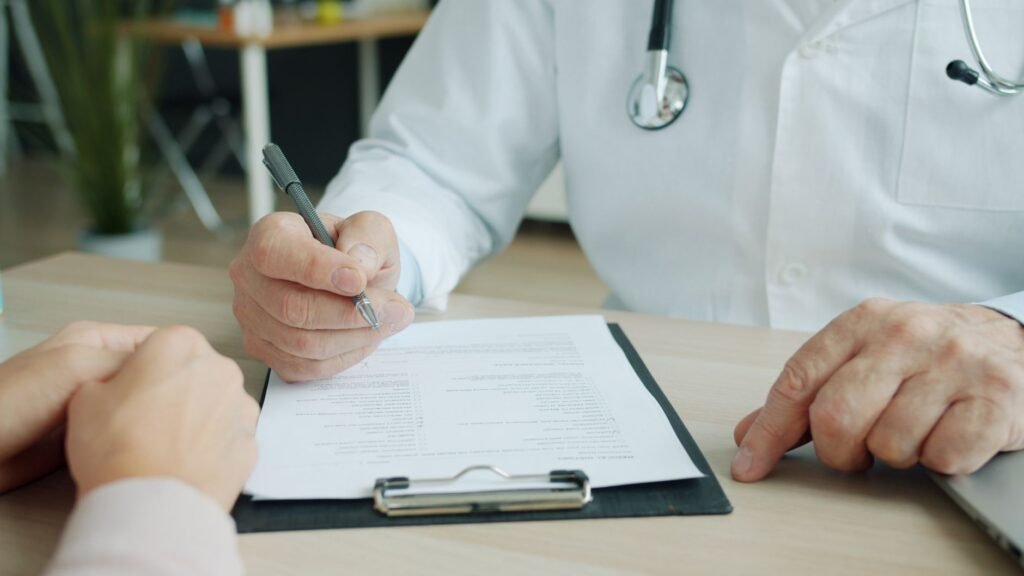 Image of an insurance representative examining claim documents. — gather evidence injury claim